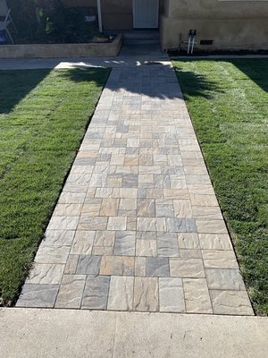 Paver Sidewalk & Patio - In this we tore out the ould landscaping and removed the excess dirt, then we installed sprinklers, a paver sidewalk patio in the back with a retaining wall for a raised flower bed. Paver Sidewalk & Patio - In this we tore out the ould landscaping and removed the excess dirt, then we installed sprinklers, a paver sidewalk patio in the back with a retaining wall for a raised flower bed.