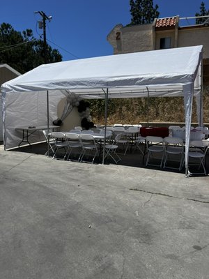 Graduation party - This is one of are party tents 20x13 an the tables are the 6ft with all white chairs. Graduation party - This is one of are party tents 20x13 an the tables are the 6ft with all white chairs.