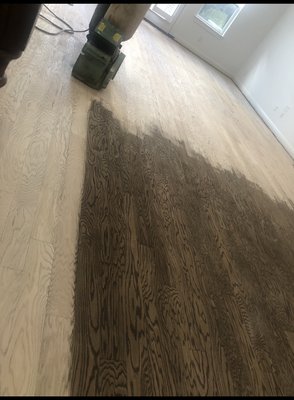 Engineered floor sanding - This engineered wood was sanded down to bare wood after testing a board out before hand. We did a color change to match upstairs floor as close as possible Engineered floor sanding - This engineered wood was sanded down to bare wood after testing a board out before hand. We did a color change to match upstairs floor as close as possible