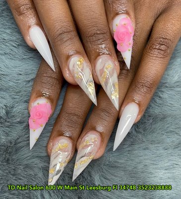 Acrylic Nail - Experience luxury with marble pointy nails, beautifully enhanced by intricate 3D flower accents. A stunning design for a bold and elegant look! Acrylic Nail - Experience luxury with marble pointy nails, beautifully enhanced by intricate 3D flower accents. A stunning design for a bold and elegant look!