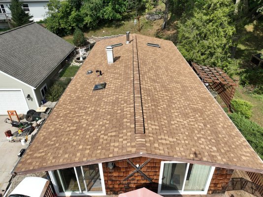 Antioch IL Roof Replacement - Before and after photos of an Antioch, Illinois home where Absolute Roofing completed a tear-off and replacement of the roof with CertainTeed Landmark asphalt shingles.