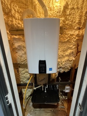 Tankless Install - Switching from a traditional tank water heater to a tankless water heater offers several benefits. Here are the key advantages and reasons why many people make the change:
Benefits of a Tankless Water Heater:
1. Endless Hot Water:
Tankless water heaters heat water on demand, so you never run out of hot water, even during long showers or heavy usage.
2. Energy Efficiency:
• Tankless systems only heat water when needed, reducing standby heat loss (common in tank systems).
• They can save 20-40% on energy bills compared to traditional heaters.
3. Space-Saving Design:
• These units are compact and wall-mounted, freeing up floor space that a bulky tank would occupy.
4. Longer Lifespan:
• Tankless water heaters typically last 20 years or more, compared to 10-15 years for tank heaters.
5. Reduced Risk of Leaks and Water Damage:
• Without a large storage tank, the risk of catastrophic leaks and flooding is significantly lower.
6. Improved Water Quality:
• No tank means no rust or sediment buildup in stored water, resulting in cleaner water.
7. Eco-Friendly Option:
• Tankless water heaters use less energy, reducing your carbon footprint.
Why Remove a Tank Water Heater?
1. Limited Hot Water Supply:
Traditional tank systems store a finite amount of hot water, leading to cold showers when the tank is emptied.
2. Higher Energy Costs:
Tanks continuously heat stored water to maintain the desired temperature, even when not in use.
3. Space Constraints:
• A large tank can take up valuable space, especially in smaller homes.
4. Shorter Lifespan and Maintenance Needs:
• Tanks require frequent maintenance to flush out sediment and have a shorter operational life.
5. Risk of Leaks and Flooding:
• Old tanks are prone to corrosion and leaks, potentially causing water damage.
Switching to a tankless water heater not only improves efficiency and convenience but also eliminates many of the drawbacks of a traditional tank system. It’s an investment that pays off in comfort, energy savings, and peace of mind. Tankless Install - Switching from a traditional tank water heater to a tankless water heater offers several benefits. Here are the key advantages and reasons why many people make the change:
Benefits of a Tankless Water Heater:
1. Endless Hot Water:
Tankless water heaters heat water on demand, so you never run out of hot water, even during long showers or heavy usage.
2. Energy Efficiency:
• Tankless systems only heat water when needed, reducing standby heat loss (common in tank systems).
• They can save 20-40% on energy bills compared to traditional heaters.
3. Space-Saving Design:
• These units are compact and wall-mounted, freeing up floor space that a bulky tank would occupy.
4. Longer Lifespan:
• Tankless water heaters typically last 20 years or more, compared to 10-15 years for tank heaters.
5. Reduced Risk of Leaks and Water Damage:
• Without a large storage tank, the risk of catastrophic leaks and flooding is significantly lower.
6. Improved Water Quality:
• No tank means no rust or sediment buildup in stored water, resulting in cleaner water.
7. Eco-Friendly Option:
• Tankless water heaters use less energy, reducing your carbon footprint.
Why Remove a Tank Water Heater?
1. Limited Hot Water Supply:
Traditional tank systems store a finite amount of hot water, leading to cold showers when the tank is emptied.
2. Higher Energy Costs:
Tanks continuously heat stored water to maintain the desired temperature, even when not in use.
3. Space Constraints:
• A large tank can take up valuable space, especially in smaller homes.
4. Shorter Lifespan and Maintenance Needs:
• Tanks require frequent maintenance to flush out sediment and have a shorter operational life.
5. Risk of Leaks and Flooding:
• Old tanks are prone to corrosion and leaks, potentially causing water damage.
Switching to a tankless water heater not only improves efficiency and convenience but also eliminates many of the drawbacks of a traditional tank system. It’s an investment that pays off in comfort, energy savings, and peace of mind.