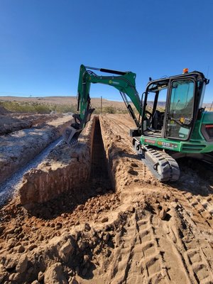 Septic System Installation - The customer was acting as Owner-Builder on this project, and they hired us to do all the excavating for the new septic system, which included a 200gal concrete tank and 320 lineal feet of leach field trench/piping.