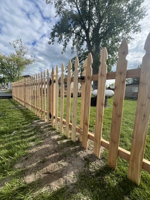Harsens Island, MI - This customer on Harsens Island, needed a fence to keep your four legged friends safe in the yard, while not losing any view of their waterfront lake view! Best of both worlds with this one!