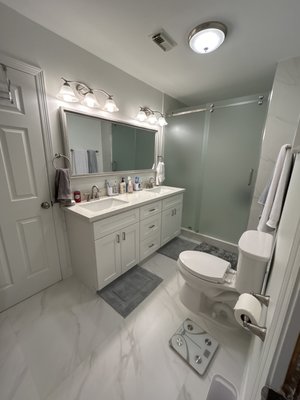 Transforming Closet Storage into a Stunning and Functional Bathroom - We converted an unused closet storage space into a beautiful and fully functional bathroom, tailored to meet our client's needs. This project required brand-new plumbing and electrical work to accommodate the new layout. We installed stylish new flooring, a modern vanity, a sleek toilet, and a custom shower for both comfort and convenience. With fresh paint to tie it all together, the result is a seamless addition that enhances both the functionality and aesthetic appeal of the home. Another successful transformation by Mink Remodeling! Transforming Closet Storage into a Stunning and Functional Bathroom - We converted an unused closet storage space into a beautiful and fully functional bathroom, tailored to meet our client's needs. This project required brand-new plumbing and electrical work to accommodate the new layout. We installed stylish new flooring, a modern vanity, a sleek toilet, and a custom shower for both comfort and convenience. With fresh paint to tie it all together, the result is a seamless addition that enhances both the functionality and aesthetic appeal of the home. Another successful transformation by Mink Remodeling!