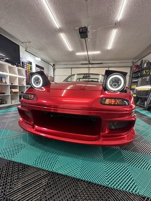 1996 Mazda Miata wrapped in Gloss Soul Red - Mazda Miata in a bold red wrap – a classic with a fresh look! 🔥 
The sleek, glossy finish enhances the car’s sporty style and elegant lines.