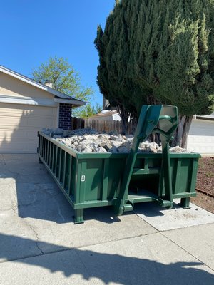 10 Cubic Yard (Clean Concrete) - For concrete disposal, we exclusively offer our 10 cubic yard dumpster, as it is the only size capable of safely accommodating the weight of heavy materials like concrete.
We provide this dumpster at a flat rate with no weight limit as all disposal fees are included. “Clean concrete” refers to concrete only, and pricing will vary if any other materials are mixed in.
The 10 cubic yard is 2.5ft H x 8ft W x 14ft L. Like all our dumpsters, it has double doors that swing open for easy access. There is no weight limit on any heavy debris containers. 10 Cubic Yard (Clean Concrete) - For concrete disposal, we exclusively offer our 10 cubic yard dumpster, as it is the only size capable of safely accommodating the weight of heavy materials like concrete.
We provide this dumpster at a flat rate with no weight limit as all disposal fees are included. “Clean concrete” refers to concrete only, and pricing will vary if any other materials are mixed in.
The 10 cubic yard is 2.5ft H x 8ft W x 14ft L. Like all our dumpsters, it has double doors that swing open for easy access. There is no weight limit on any heavy debris containers.