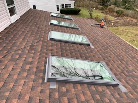 Highland Skylight and Shingles - This addition needed 3 skylights replaced along with shingles to stop a leak from coming into the home. We switched out the skylights and installed custom Velux Skylights with New Timberline Shingles to bring this roof back to life!