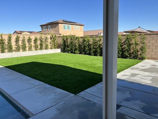 Indio, California  - This project was done in a brand new home in Indio California. We install artificial turf concrete, 15 gallons ficus , three-quarter inch snow white rock planter for Ficus everything custom-made.  Indio, California  - This project was done in a brand new home in Indio California. We install artificial turf concrete, 15 gallons ficus , three-quarter inch snow white rock planter for Ficus everything custom-made. 
