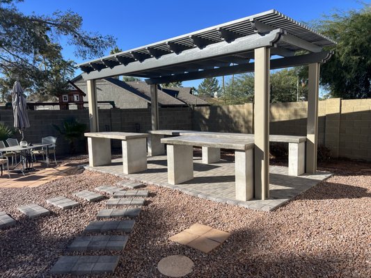 Scottsdale landscaping remodel - this remodel needed demolition of the areas to be properly sloped for drainage. then we came in and installed a pergola, concrete countertops, paver driveway extensions and paver pads for additional sitting areas, this also came with a matching paver firepit.