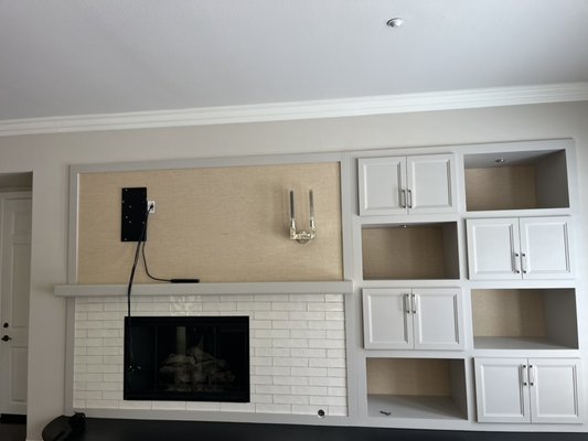Tv wall renovation - TV wall renovation — removal of the old wall, installation of new cement boards for added strength and TV support, large-format tile installation, detailed tile finishing, and installation of a concealed outlet behind the TV. Tv wall renovation - TV wall renovation — removal of the old wall, installation of new cement boards for added strength and TV support, large-format tile installation, detailed tile finishing, and installation of a concealed outlet behind the TV.