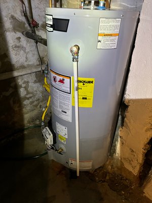 Water Heater Replacement - We helped this client install their new water heater and removed the old one. We re-piped the gas line so the water heater controls is facing front. We also added a gas shut off valve, a ball valve for the hot water, and a new temperature and pressure valve drain tube for the water heater.
