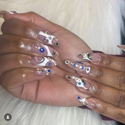 Acrylic Nails - Welcome to [Salon Name]—where artistry meets precision. Our portfolio showcases a stunning collection of expertly crafted acrylic nails, featuring clean, crisp designs that highlight our attention to detail and creativity. From elegant, minimalist sets to bold, hand-painted masterpieces, we specialize in sculpting flawless acrylic enhancements with a seamless finish.