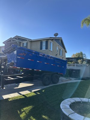 Bin Rental for Home Remodeling Contractor - Contractor requested a 15-yard dumpster to dispose of old carpet, tile and cabinets we placed the dumpster in the driveway and placed wood under the wheels to avoid damaging the concrete. Bin Rental for Home Remodeling Contractor - Contractor requested a 15-yard dumpster to dispose of old carpet, tile and cabinets we placed the dumpster in the driveway and placed wood under the wheels to avoid damaging the concrete.