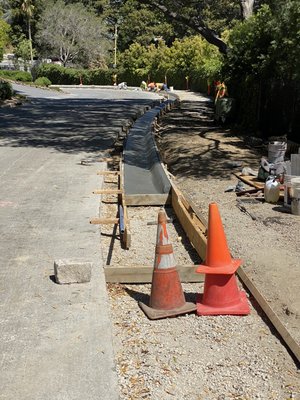 Curb and gutter replacement. - Curb and gutter replacement, job consisted in saw cutting, demolishing existing curb and gutter, Excavating to allow 12 inches of class 2 AB, pour new curb and gutter and paving a long new curb and gutter.