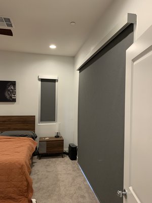 Motorized Shade Installation - Beautiful new home that dramatically shows the difference between a true blackout roller shade and normal “Blackout roller Shades”.   The client chose motorized, True Blackout rollers in the Master Bedroom and Normal Blackout Roller shades through the rest of the home.   I love the way the master bedroom slider and windows turned out!