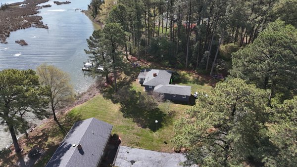 Showcasing Property - "Explore the stunning lakeside charm of this Airbnb property with aerial photography by Go-Getter Drone. Captured by me, Albert Ingram, this image highlights the serene environment and lush greenery, offering a unique perspective that showcases the true beauty and appeal of the location. Perfect for attracting more guests, our high-quality drone visuals enhance the listing, making it stand out. Trust Go-Getter Drone to elevate your Airbnb with captivating and professional aerial imagery." Showcasing Property - "Explore the stunning lakeside charm of this Airbnb property with aerial photography by Go-Getter Drone. Captured by me, Albert Ingram, this image highlights the serene environment and lush greenery, offering a unique perspective that showcases the true beauty and appeal of the location. Perfect for attracting more guests, our high-quality drone visuals enhance the listing, making it stand out. Trust Go-Getter Drone to elevate your Airbnb with captivating and professional aerial imagery."