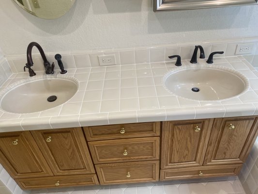 Dual Vanity Re-Grout - Both of these vanities look stunning again, once the grout was torn out and replaced!