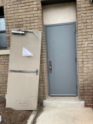 Door Replacement - Remove and replace metal door on building. Keyway Locksmith technician provided parts and replaced door on a commercial project. If you need metal door replacement service we can help. Call Keyway today.