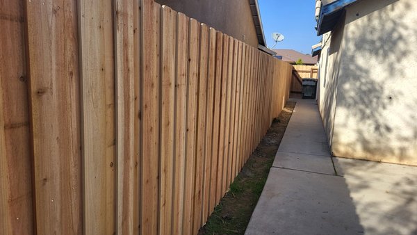 Nail Up Fence Installation in Fresno - A fence isn’t only for improving the curb appeal of your home. Read on to learn some benefits of getting a new privacy fence.ValueInstalling a new fence can improve the total value of your property. So, if you’re considering selling your home, a simple home improvement project like a new fence could be a smart investment. In some cases, installing a fence could even help you save on taxes. Click here to learn more. Reduce Noise Want to have a relaxing time in your yard? Consider getting a fence to help drown out to sounds of the neighborhood. It also works both ways and dampens any noise coming from your yard as well. Great for Children and PetsA fence around your yard can create a safe, secluded place for your children and pets to play in. Of course, you’ll want to make sure the fence you choose is child and pet-friendly. That means avoiding metal fences, or fences with large gaps between pickets. To read more about picking the right fence for your family, click here. Safety and SecurityA fence can help deter trespassers and keep prying eyes away from your home. Fences can also help keep stray animals off of your property. By having a boundary around your property, you can enjoy your yard in peace. Visual AppealThere are a lot of different styles and materials you can use for a fence. You’re sure to find a style that fits your home perfectly.