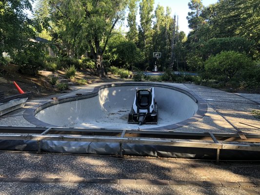 Swimming pool demolition - This is a swimming pool project in Hillsborough ca. This project consisted of removing the entire swimming pool concrete shell. Our client chose the option of engineered backfill which requires a professional engineer to test the soil density and compaction as we backfill. The enginer then submits a letter and compaction results to the city which allows the owner to potentially build a structure on that area Swimming pool demolition - This is a swimming pool project in Hillsborough ca. This project consisted of removing the entire swimming pool concrete shell. Our client chose the option of engineered backfill which requires a professional engineer to test the soil density and compaction as we backfill. The enginer then submits a letter and compaction results to the city which allows the owner to potentially build a structure on that area