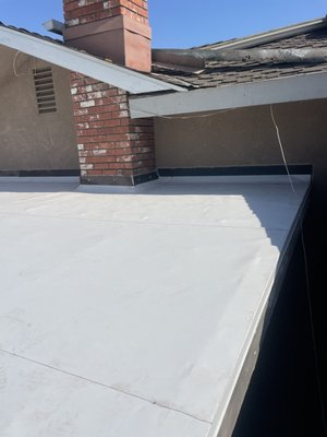 Patio Flat Roof Replacement - Residential customer had expired roll roofing on their patio and choose to upgrade with commercial grade TPO material that lasts longer and reflects the sun!