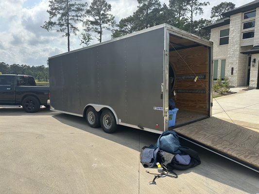 Enclosed Trailer Loading and Secure Transport Preparation - We recently completed a full residential packing and trailer-loading project in Spring, TX. Our team professionally packed a 20-foot enclosed V-Series trailer with over 40 labeled boxes, household appliances, and furniture for safe transport. We used heavy-duty moving blankets, straps, and E-track systems to secure every item and ensure nothing shifted during travel.
From start to finish, we focused on maximizing space, protecting valuables, and ensuring a balanced load for smooth towing. Whether you’re moving across town or out of state, we’ve got the tools and experience to handle it with care.
Packed Right. Moved Safe. Every Time. Enclosed Trailer Loading and Secure Transport Preparation - We recently completed a full residential packing and trailer-loading project in Spring, TX. Our team professionally packed a 20-foot enclosed V-Series trailer with over 40 labeled boxes, household appliances, and furniture for safe transport. We used heavy-duty moving blankets, straps, and E-track systems to secure every item and ensure nothing shifted during travel.
From start to finish, we focused on maximizing space, protecting valuables, and ensuring a balanced load for smooth towing. Whether you’re moving across town or out of state, we’ve got the tools and experience to handle it with care.
Packed Right. Moved Safe. Every Time.