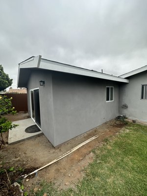 Clairemont Accessory Dwelling Unit - This recently completed ADU was constructed at the rear of the existing garage and includes a bedroom, bathroom, laundry, and combination kitchen/living area Clairemont Accessory Dwelling Unit - This recently completed ADU was constructed at the rear of the existing garage and includes a bedroom, bathroom, laundry, and combination kitchen/living area
