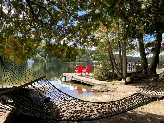 Play on our private lake - RENT our Waterfront Chalet nestled in a Mountain lake for just a weekend, week or month. Come swim, hike, fish, kayak, skate or even train for a Triathlon. Tired and need to unwind, then just rest, read and relax on our hammock.