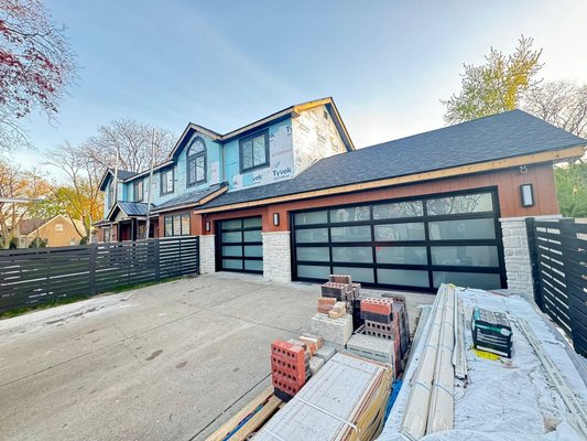 Sleek Transformation: Full View Aluminum Door Installation - We replaced this outdated raised-panel door with modern Full View Aluminum door complete with full insulation and aluminum capping. Clean lines, better insulation, and impressive style.