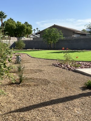 Landscape Construction - We constructed a new landscape from scratch for this project. Our client had a few requirements and all were met and exceeded! We installed artificial turf, many large established plants and trees and transformed it into a fun and useable space for her dogs! From design, to construction we can take care of it all. Landscape Construction - We constructed a new landscape from scratch for this project. Our client had a few requirements and all were met and exceeded! We installed artificial turf, many large established plants and trees and transformed it into a fun and useable space for her dogs! From design, to construction we can take care of it all.