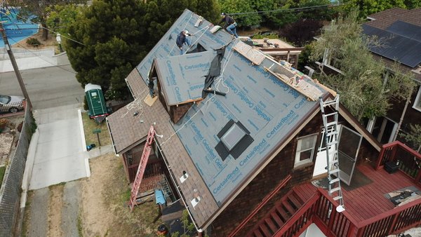 Re-roof 2025 - This reroof was done in Berkeley on a steep roof that had 3-tab shingles. The new roof is an energy efficient dimensional shingle. Re-roof 2025 - This reroof was done in Berkeley on a steep roof that had 3-tab shingles. The new roof is an energy efficient dimensional shingle.