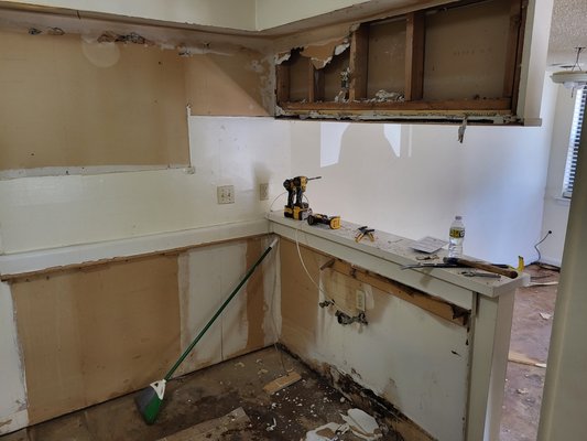 Townhome remodeling - we gutted the entire house, upgrading lighting fixtures, cabinets, granite countertops, new flooring, and faucets. etc