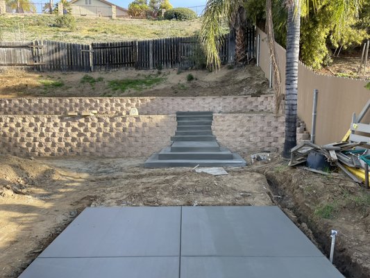 Retaining walls - This are two separate projects, one with a gravity stack retaining block, one with traditional block.