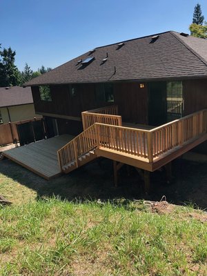 450 SqFt Cedar deck- Front and Back - This is a complete tear down and rebuild of a 450 Square Foot Cedar Deck, including the front landing and steps, as well as a two level backyard deck. 450 SqFt Cedar deck- Front and Back - This is a complete tear down and rebuild of a 450 Square Foot Cedar Deck, including the front landing and steps, as well as a two level backyard deck.