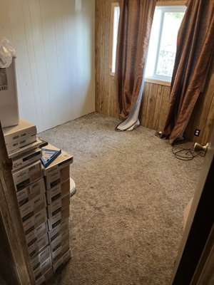 Bedroom Remodel - This remodel was done on a bedroom that was in bad shape. It was the pet room and the carpet was very worn. We updated it with new laminate that is water and scratch-proof. Not only did it brighten up the room, but its durability was enough to withstand the wear caused by the pets. Bedroom Remodel - This remodel was done on a bedroom that was in bad shape. It was the pet room and the carpet was very worn. We updated it with new laminate that is water and scratch-proof. Not only did it brighten up the room, but its durability was enough to withstand the wear caused by the pets.