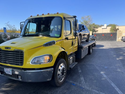We Provide Roadside Assistance and Towing! - Call us for assistance or a tow to the shop that works best for you!