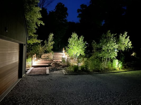 Lighting project Elkhart lake - This Lighting Install was performed in Elkhart Lake on a beautiful property with many all lights shining on the path and the up lights shining up on birch trees
