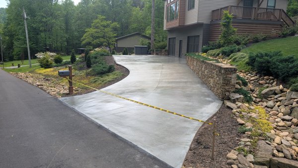 Concrete Driveway - We replaced a crumbling asphalt driveway with concrete.  Lasts longer, look better.