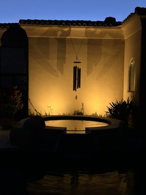 North Scottsdale Lighting Revamp - We had an enjoyable time tackling this backyard lighting remodel! The space was initially very dark, so I added a series of new path lights along the walkway, not only to improve safety but also to create a warm, inviting ambiance. I also incorporated accent uplighting for the bougainvillea, which really brought out its vibrant colors and added a dramatic focal point to the garden. Additionally, I installed two wash lights behind the hot tub that elegantly highlighted the hanging wind chime, adding a playful touch to the overall design.
Throughout the project, I carefully planned the placement of each light to ensure a balanced mix of functionality and visual appeal. The thoughtful design transformed the backyard into a cozy, enchanting retreat that the client was extremely pleased with. North Scottsdale Lighting Revamp - We had an enjoyable time tackling this backyard lighting remodel! The space was initially very dark, so I added a series of new path lights along the walkway, not only to improve safety but also to create a warm, inviting ambiance. I also incorporated accent uplighting for the bougainvillea, which really brought out its vibrant colors and added a dramatic focal point to the garden. Additionally, I installed two wash lights behind the hot tub that elegantly highlighted the hanging wind chime, adding a playful touch to the overall design.
Throughout the project, I carefully planned the placement of each light to ensure a balanced mix of functionality and visual appeal. The thoughtful design transformed the backyard into a cozy, enchanting retreat that the client was extremely pleased with.