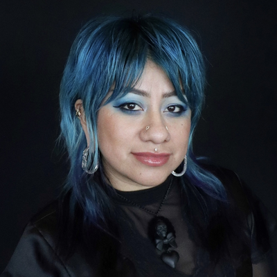 Elizabeth - Piercer - Elizabeth is originally from San Diego but quickly became enamored with NY when arriving 9 years ago. She is a roadie who not only has done cross country twice, but also has worked in different states working next to leading professionals in the piercing industry.
Elizabeth travels to take courses and keep her piercing knowledge up to date. Having worked in different studios Elizabeth has learned many techniques and styles of piercing, being able to easily adapt in different environments.
Elizabeth is enthusiastic about safety and only uses the most up to date sterilization, skin prep, and protocols. Beyond protocols you can ensure Elizabeth will only perform with the highest grades of jewelry that meet all safely regulations, tested, and certified jewelry.
Elizabeth loves spending time with her clients and making sure everyone is comfortable.
No piercing job is too small or too plain for her, she finds excitement in every piercing because she never forgets how much joy one singular piercing can bring.
Elizabeth’s life revolves around art and when she’s not piercing she’s picking up as many art projects she can find. Being creative transfers over into piercings and she loves curating ears with clients and putting together custom pieces for clients.
One thing that Elizabeth enjoys is piercing kids. “We have a hoot” she says. Elizabeth loves to carry a selection of fun jewelry just for kids. The jewelry is not only fun but carries a certification of safety. Elizabeth - Piercer - Elizabeth is originally from San Diego but quickly became enamored with NY when arriving 9 years ago. She is a roadie who not only has done cross country twice, but also has worked in different states working next to leading professionals in the piercing industry.
Elizabeth travels to take courses and keep her piercing knowledge up to date. Having worked in different studios Elizabeth has learned many techniques and styles of piercing, being able to easily adapt in different environments.
Elizabeth is enthusiastic about safety and only uses the most up to date sterilization, skin prep, and protocols. Beyond protocols you can ensure Elizabeth will only perform with the highest grades of jewelry that meet all safely regulations, tested, and certified jewelry.
Elizabeth loves spending time with her clients and making sure everyone is comfortable.
No piercing job is too small or too plain for her, she finds excitement in every piercing because she never forgets how much joy one singular piercing can bring.
Elizabeth’s life revolves around art and when she’s not piercing she’s picking up as many art projects she can find. Being creative transfers over into piercings and she loves curating ears with clients and putting together custom pieces for clients.
One thing that Elizabeth enjoys is piercing kids. “We have a hoot” she says. Elizabeth loves to carry a selection of fun jewelry just for kids. The jewelry is not only fun but carries a certification of safety.