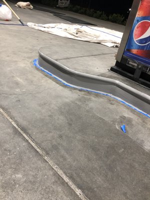 Gas station curb painting - Painted curb at local gas station Gas station curb painting - Painted curb at local gas station