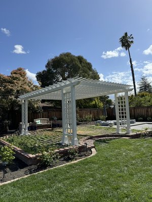 Pergola with matching fence and arbor - Client had a vision of how she wanted her backyard to look. She provided an example pergola that she found online and we were able to bring her vision to life. Pergola with matching fence and arbor - Client had a vision of how she wanted her backyard to look. She provided an example pergola that she found online and we were able to bring her vision to life.