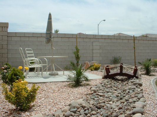 Desert Hardscape - Desert Xeriscape is a landscape design that requires little  to no irrigation or maintenance.  Great for water conservation. Its rugged and natural form of design.