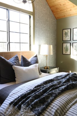 Guest Room Design - We took an oddly shaped bedroom and utilized all its corners. Reimagining the layout and creating function as well as flow for their guests who visit often. 
Scope of design work; new hardwood floors, paint, wallpaper, ceiling detail, lighting, furniture, textiles, art.
