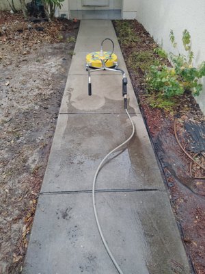 driveway washing - pressure washing a walkway so the kids wouldn't slip and slide when it rains