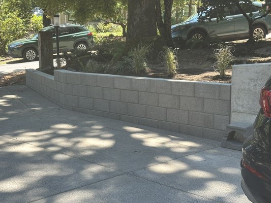 Retaining walls - Completed two custom retaining wall projects for two different homeowners. Each wall was carefully excavated, leveled, and built on a compacted gravel base to ensure proper drainage, stability, and long-term durability. High-quality retaining wall blocks were installed with precision to create a clean, attractive finish while providing structural support and improving the overall landscape. Retaining walls - Completed two custom retaining wall projects for two different homeowners. Each wall was carefully excavated, leveled, and built on a compacted gravel base to ensure proper drainage, stability, and long-term durability. High-quality retaining wall blocks were installed with precision to create a clean, attractive finish while providing structural support and improving the overall landscape.