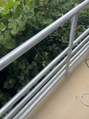 Exterior railings refinished - After hurricane Ian, old railing paint started to peel or were damaged during storm. Instead of removing all railings and to have them powder coated that would of taken months to do because of demand. We jumped on the project quickly. Sanded aluminum railings right on the spot to bare metal. Resprayed with DMT paint with extra coats of for better protection. Customer saved a lot of money and time by getting us to work on it right on the spot. Exterior railings refinished - After hurricane Ian, old railing paint started to peel or were damaged during storm. Instead of removing all railings and to have them powder coated that would of taken months to do because of demand. We jumped on the project quickly. Sanded aluminum railings right on the spot to bare metal. Resprayed with DMT paint with extra coats of for better protection. Customer saved a lot of money and time by getting us to work on it right on the spot.