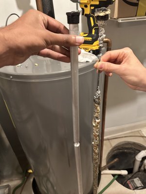 Anode Rod Replacement - This was done on an only 5 year old Water Heater.  We flushed the heater, and replaced the anode rod.  You can see how badly corroded it was, and how that water would have eaten away at the water heater, and ultimately led to an early termination, and a costly replacement had this rod not been replaced