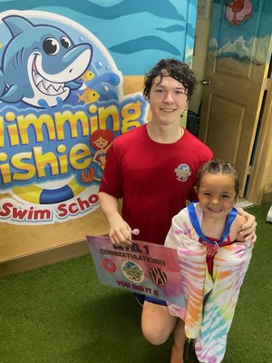 Having fun at Swimming Fishies Swim School - We have so many fun and yummy incentives that helps motivate your child to learn to swim fater and properly. We are passionate about saving lives and getting each child to have fun in the water while staying safe! Having fun at Swimming Fishies Swim School - We have so many fun and yummy incentives that helps motivate your child to learn to swim fater and properly. We are passionate about saving lives and getting each child to have fun in the water while staying safe!